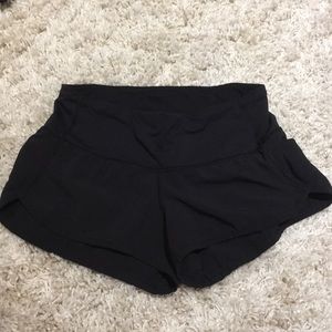 Black Lululemon Shorts with a pink zipper